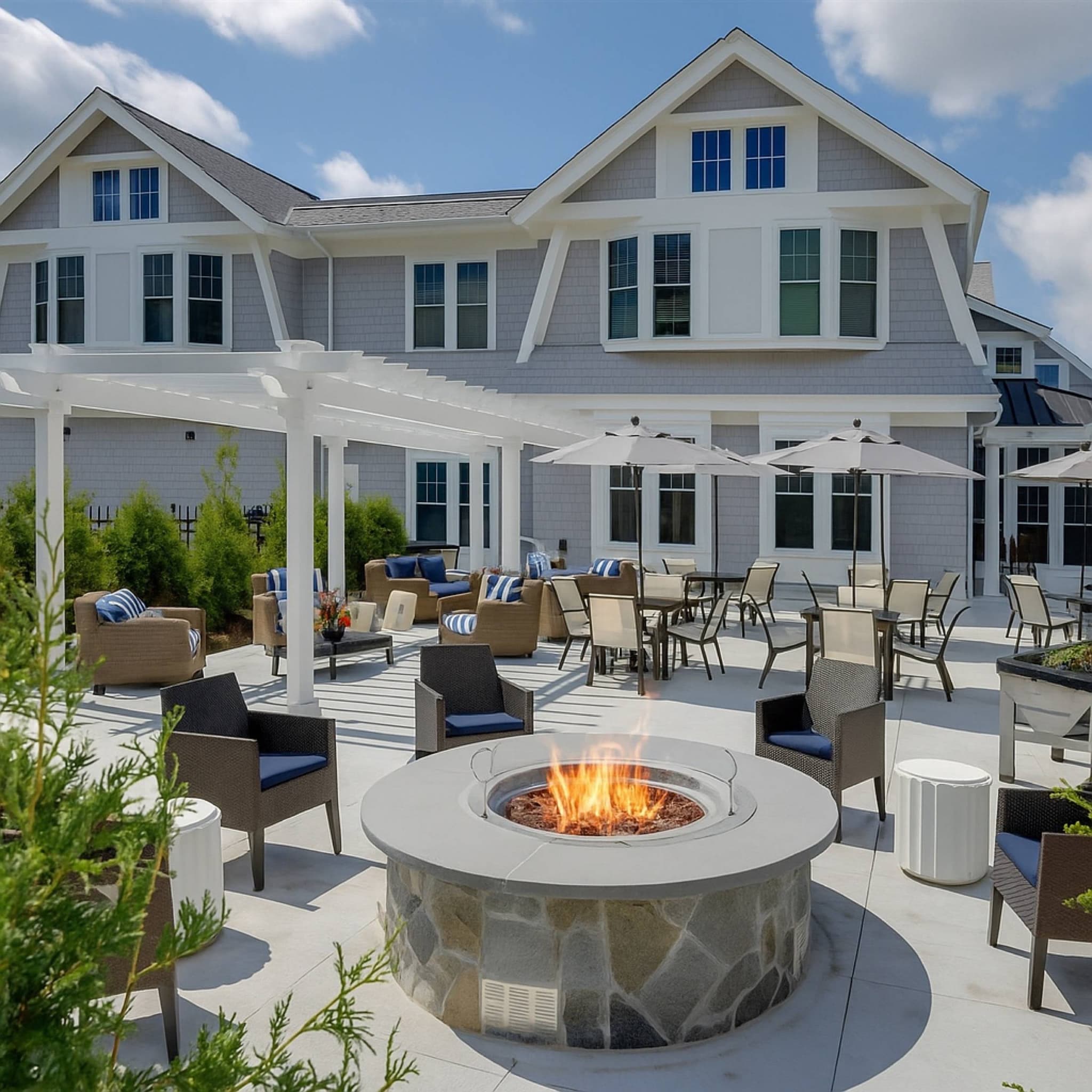 Outdoor Living: Pergolas, fire features, kitchens, and amenity terraces.